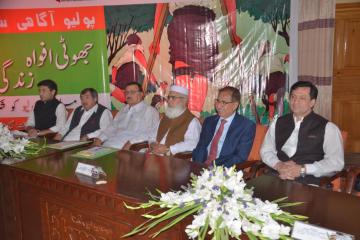 01.Secratary Health KP Dr Faruq Jamil and VC KMU Dr Arshad javaid along with others sitting on stage during Polio Agahi Seminar organized by KMU and PHA1562666184.JPG